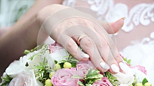 Hands of newlyweds on their wedding day