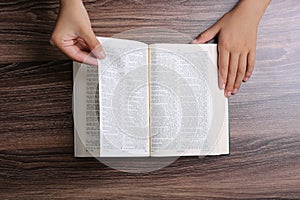 Hands With Open Bible