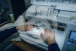 Hands Operating Sewing Machine