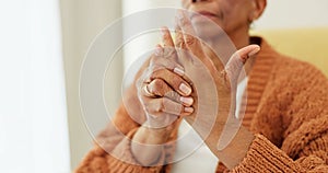 Hands, pain and arthritis with an elderly woman in her nursing home, struggling with a medical injury or problem