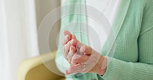 Hands, pain and arthritis with a senior woman in her nursing home, struggling with a medical injury or problem