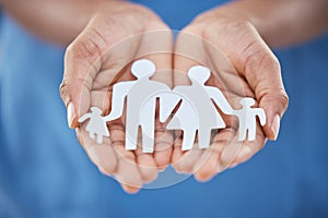 Hands, paper and advertising for family insurance, support and trust with charity, values or community. Woman hand for