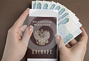 In the hands of the passport of the Russian Federation and rubles