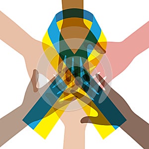 Hands of people of different nations holding ribbon with the Ukraine flag.