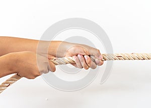 Hands of people pulling the rope. team building cooperation concept.