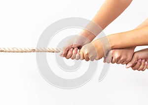 Hands of people pulling the rope. team building cooperation concept.