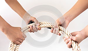 Hands of people pulling the rope. team building cooperation concept.