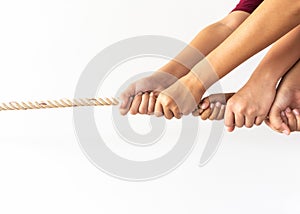 Hands of people pulling the rope. team building cooperation concept.