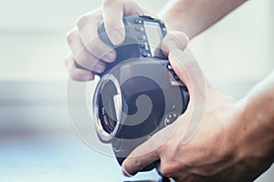Photographer is using a professional camera, open sensor photo