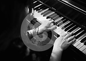 Hands on Piano Keys Playing