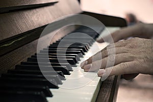 Hands and piano player