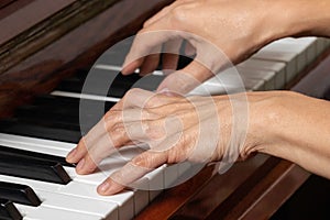 Hands of a piano player