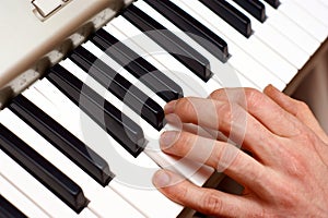 Hands and piano player