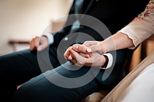 Hands, picture of man and woman with wedding ring, church wedding ceremony,love