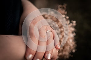 Hands, picture of man and woman with wedding ring, church wedding ceremony,love