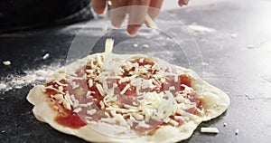 Hands, pizza dough and cheese for baking raw ingredient or cooking, production or restaurant. Chef, flour and tomato for