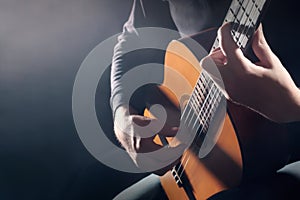 Hands playing guitar. Classical guitarist hands