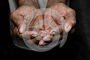 Hands poor poverty elder man begging you for help. Concept hunge