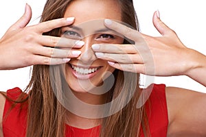 Hands, portrait and beauty with a woman in studio isolated on a white background for a skincare product. Face, dental