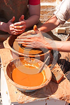 Hands of potter at work