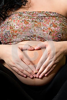 Hands on pregnant belly