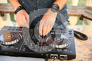 Hands of the DJ mix music