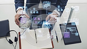 The hands of a professional, on a minimalist glass table, simultaneously arrange elements...(1)