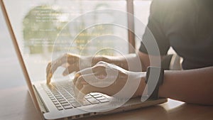 Hands of programmer typing on a laptop keyboard. computer language coding concept