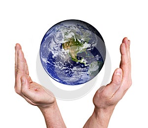 Hands protecting planet earth photo