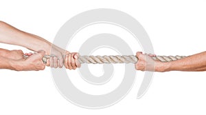 Hands pull a rope.