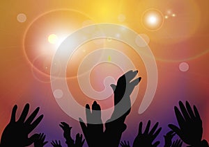 Hands raised up a group of people at the concert.