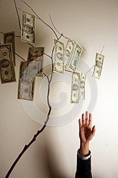 Hands reaching for money