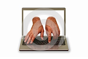 hands reaching out of laptop display and typing