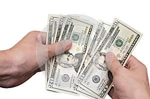 Hands recalculate U.S. dollars
