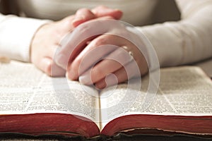 Hands on Religious Bible