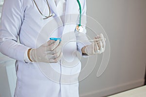 Hands and remedial catheter. photo