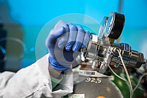 Hands of a researcher carrying out scientific research