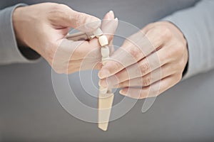 Hands with rosary beads