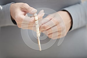 Hands with rosary beads