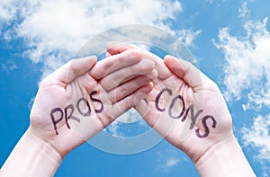 Hands that say Pros and Cons