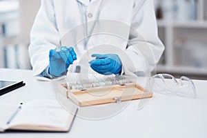 Hands, scientist and microscope slides for research, test or biology analysis in laboratory box. Equipment, micro glass