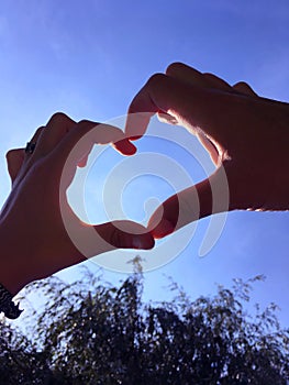 Hands shaping a heart