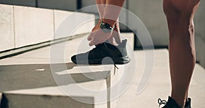 Hands, shoes and tie with an athlete on a step, getting ready for a workout as a runner in the city. Fitness, running