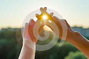 Hands show gesture symbol hashtag is viral, web, social media, network. Background is sunny urban sunset, concept for marketing, t