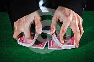 hands shuffling cards casino photo