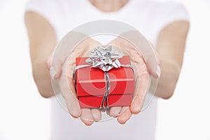 Hands With Small Wrapped Gift