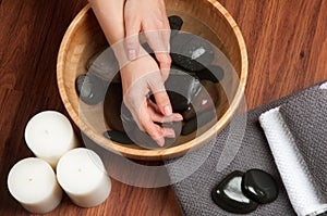 Hands spa, beautiful woman's hands in nail salon