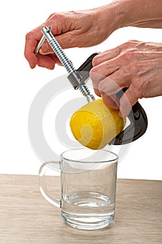 Clamp squeezes lemon