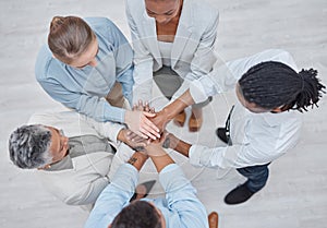 Hands stack, group circle and business people celebrate community cooperation, synergy or corporate meeting. Top view
