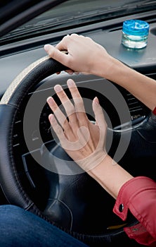 Hands on steering wheel